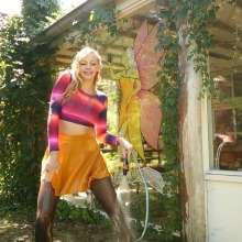 eileenvogel: W383 Eileen in party outfit dancing in the garden