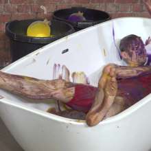 WamtasticUK: Adam Red Lycra Singlet in Gunge Bath