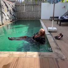 Wet_look_elena: Leather Jacket and Skirt in the Pool