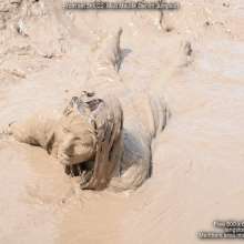 DungeonMasterOne: Maximum Mud Maude!  A wonderful fully-clothed total coverage mud frolic.