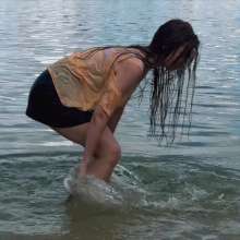 Wet Live Team: Natashka Swam in the River Fully-dressed without a Bra