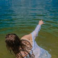Wet Live Team: Natashka Swam in the River Fully-dressed without a Bra
