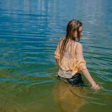 Wet Live Team: Natashka Swam in the River Fully-dressed without a Bra