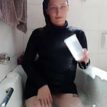 Thefetishgirl: Sexy Soaking Wet Turtle Neck and Mini Skirt