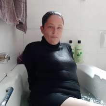 Thefetishgirl: Sexy Soaking Wet Turtle Neck and Mini Skirt