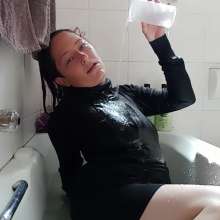 Thefetishgirl: Sexy Soaking Wet Turtle Neck and Mini Skirt