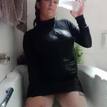 Thefetishgirl: Sexy Soaking Wet Turtle Neck and Mini Skirt