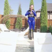 WetlookFashion: Jessica Takes a Dip Wearing a Jumpsuit, Boots and a Vest
