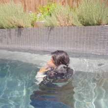 WetlookFashion: Maria in the Pool Wearing Leggings, Sweater and Boots