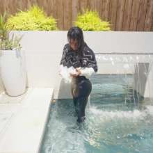 WetlookFashion: Maria in the Pool Wearing Leggings, Sweater and Boots