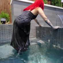 WetlookFashion: Scarlet Goes for a Swim in a Long Black Dress and Boots