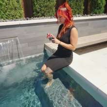 WetlookFashion: Scarlett Has a Smoke in the Hot Tub While Fully-Clothed