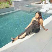 WetlookFashion: Tina Takes a Dip in the Pool Wearing a Shiny Jumpsuit