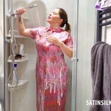 johnboy12: Siobhan steps into the shower whilst wearing a pink satin cheongsam